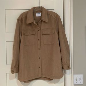 Tan/camel Old Navy Shacket with patch pockets and seam pockets on sides.